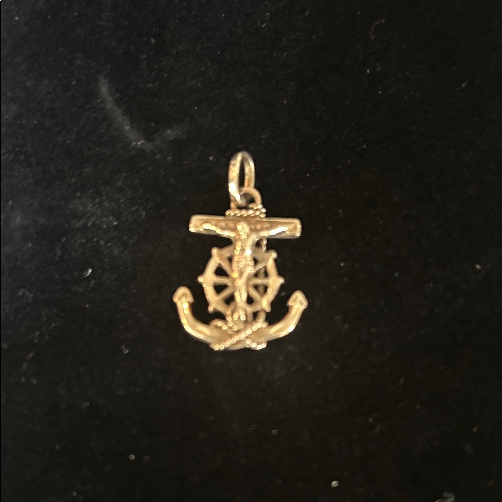 14K Gold Mariner’s prayer charm.
